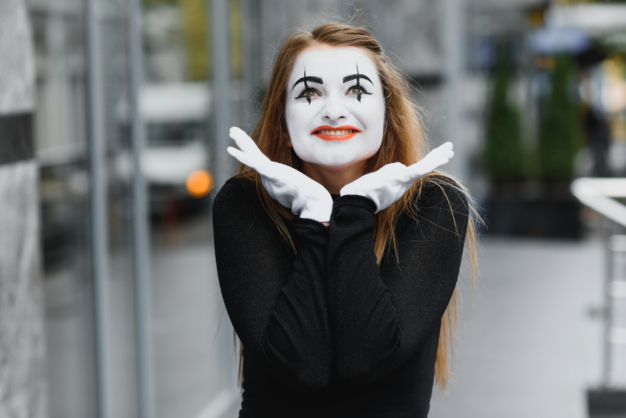 The girl with makeup of the mime. improvisation.