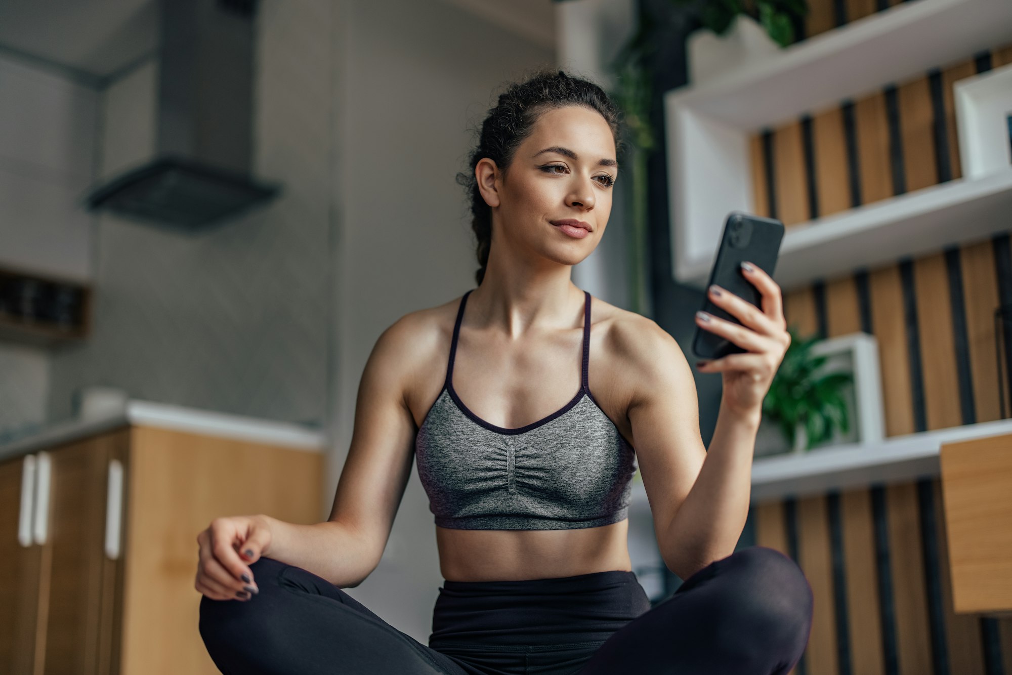 Young woman, taking a short break from training.